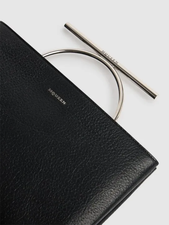 Alexander McQueen   Cross Bar grainy leather clutch 