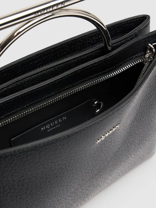 Alexander McQueen   Cross Bar grainy leather clutch 