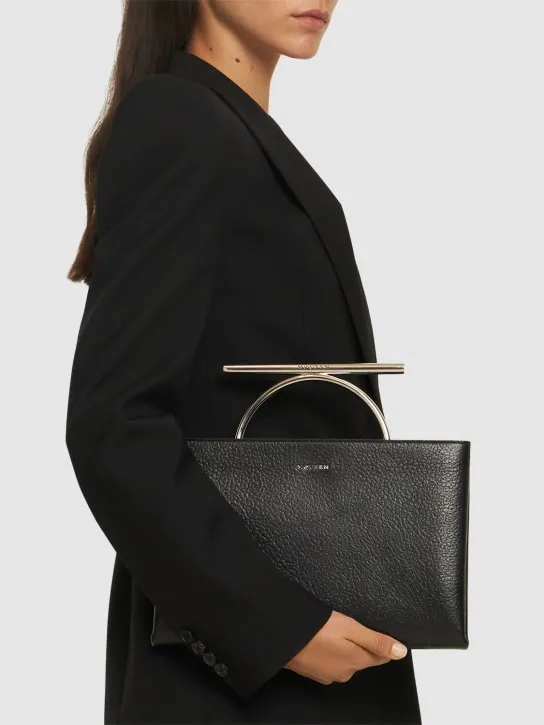 Alexander McQueen   Cross Bar grainy leather clutch 