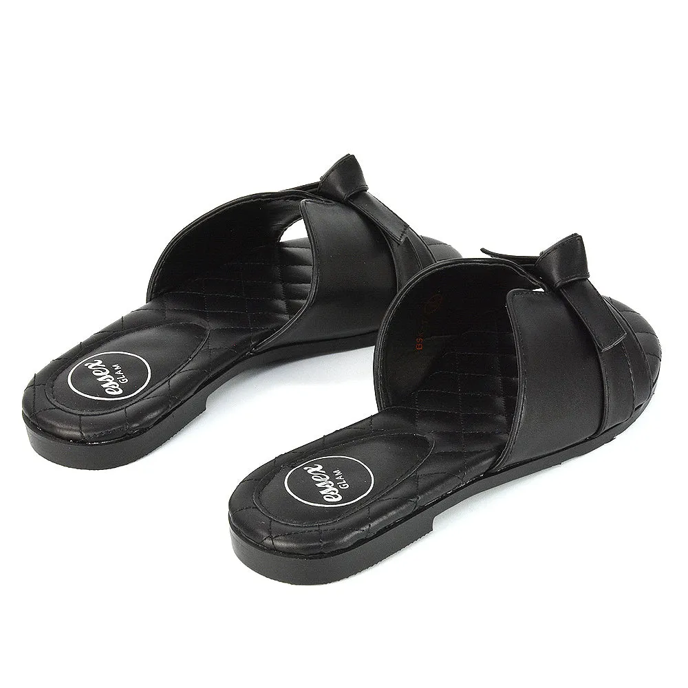 Ariella Cut Out Quilted Insole Bow Flat Slider Sandals in Black Synthetic Leather