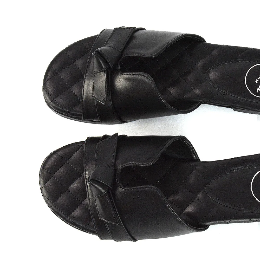 Ariella Cut Out Quilted Insole Bow Flat Slider Sandals in Black Synthetic Leather