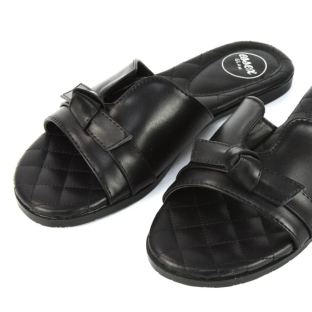 Ariella Cut Out Quilted Insole Bow Flat Slider Sandals in Black Synthetic Leather