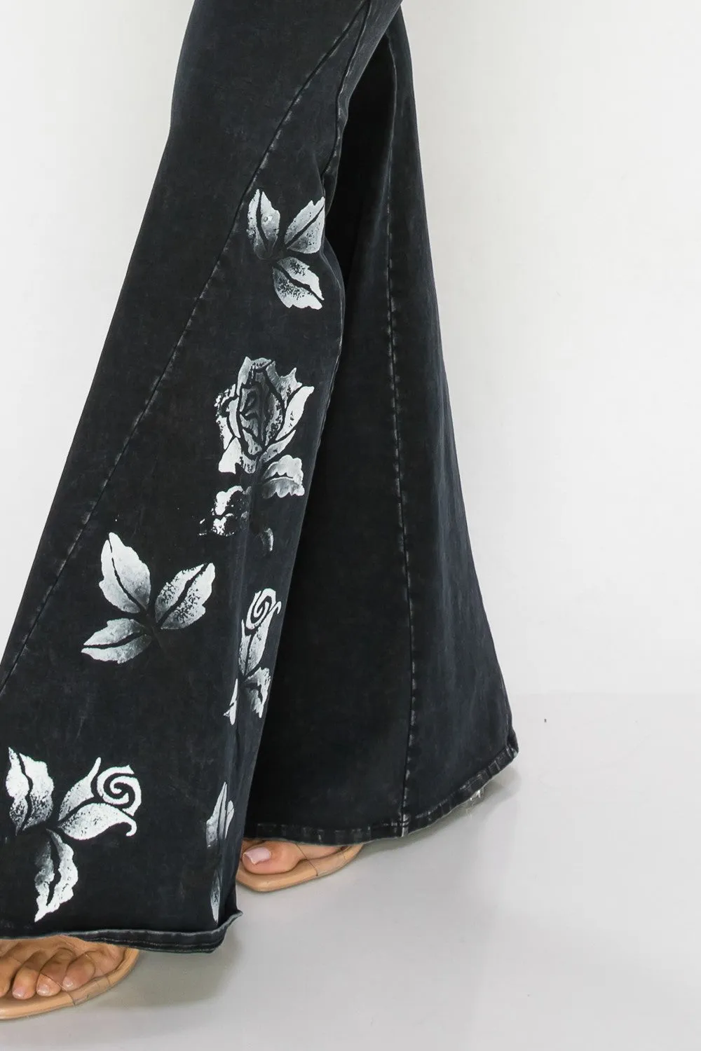 Black Pants with Printed White Rose Design