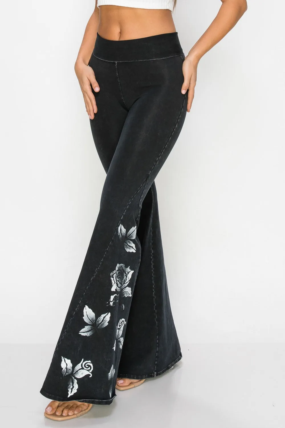 Black Pants with Printed White Rose Design
