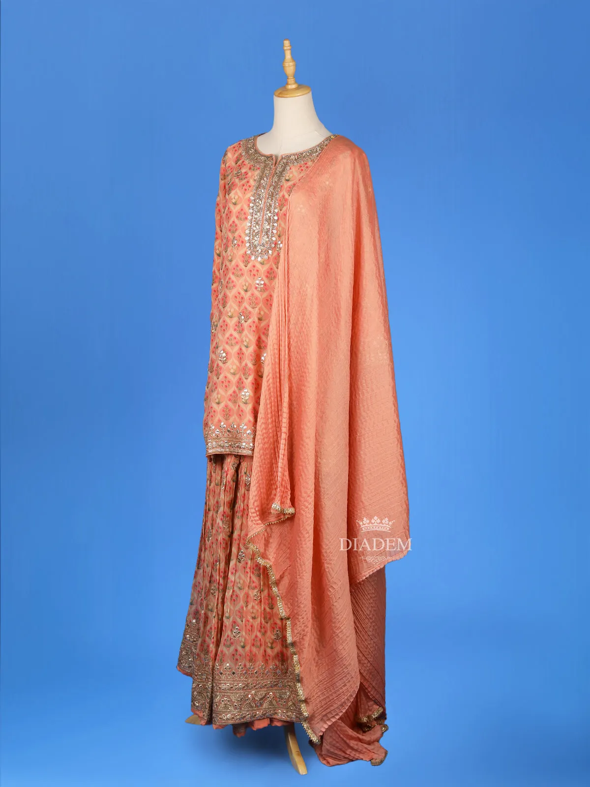 Dark Peach Sharara Set Adorned with Floral Printed Designs, Paired with Dupatta