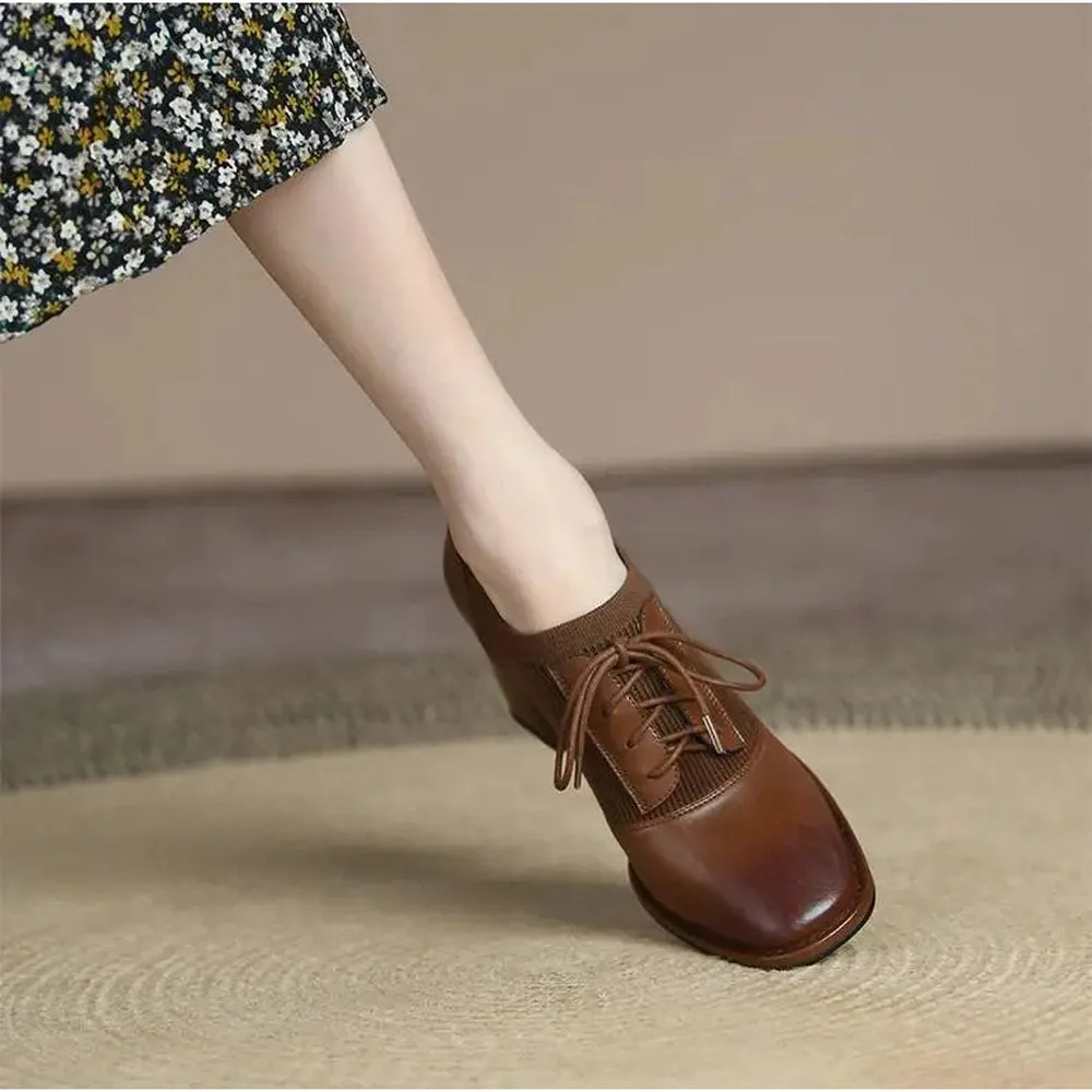 Haneen heeled brown leather ankle boots