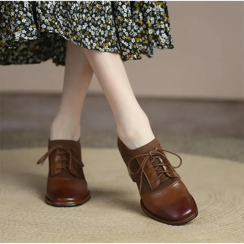 Haneen heeled brown leather ankle boots